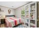 Comfortable bedroom with storage cabinet and natural light from the window at 2706 Willow St., North Myrtle Beach, SC 29582