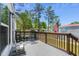 Spacious wooden deck with rocking chairs, perfect for relaxing and enjoying the outdoor view at 2706 Willow St., North Myrtle Beach, SC 29582