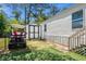 This home features a storage shed, well-maintained lawn, and a golf cart at 2706 Willow St., North Myrtle Beach, SC 29582
