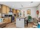 Well-equipped kitchen featuring stainless steel appliances, ample cabinet space, and a functional island with seating at 2706 Willow St., North Myrtle Beach, SC 29582