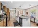 Stylish kitchen with modern cabinetry, stainless steel appliances, and a functional island with barstool seating at 2706 Willow St., North Myrtle Beach, SC 29582
