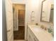 Bright bathroom featuring a white vanity with a quartz countertop and modern faucet at 2928 Moss Bridge Ln., Myrtle Beach, SC 29579