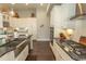 Gourmet kitchen featuring granite countertops, stainless steel appliances, and custom white cabinets at 2928 Moss Bridge Ln., Myrtle Beach, SC 29579