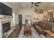 This spacious living room features hardwood flooring, fireplace, and an open concept design at 2928 Moss Bridge Ln., Myrtle Beach, SC 29579