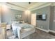 Relaxing main bedroom with a tray ceiling, a TV, and a serene color palette at 2928 Moss Bridge Ln., Myrtle Beach, SC 29579