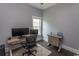 Home office space featuring a modern desk, and a light gray color scheme at 2928 Moss Bridge Ln., Myrtle Beach, SC 29579
