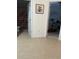Hallway with tile flooring with views of bathroom and main bedroom at 307 Black Oak Ln. # 102, Murrells Inlet, SC 29576