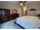 Neutral main bedroom featuring carpeted floors and wooden furnishings at 307 Black Oak Ln. # 102, Murrells Inlet, SC 29576