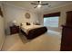 Relaxing main bedroom with carpet, neutral decor and a ceiling fan at 307 Black Oak Ln. # 102, Murrells Inlet, SC 29576