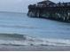 Ocean view of the pier and waves with a great view of the water and sky at 307 Black Oak Ln. # 102, Murrells Inlet, SC 29576