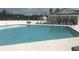 Sparkling community pool with lounge chairs, perfect for relaxing and enjoying the sunshine at 307 Black Oak Ln. # 102, Murrells Inlet, SC 29576
