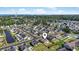Aerial view of a neighborhood near a pond, ocean, and city in the distance at 313 Palladium Dr., Surfside Beach, SC 29575
