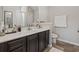 Bathroom with a single sink vanity, a toilet, and a shower/tub combo at 313 Palladium Dr., Surfside Beach, SC 29575