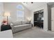 Bright bedroom with a comfortable couch, vaulted ceiling, and built in desk at 313 Palladium Dr., Surfside Beach, SC 29575