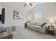 Bedroom with a vaulted ceiling, large window, neutral tones, and a comfortable couch at 313 Palladium Dr., Surfside Beach, SC 29575
