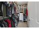 Organized walk-in closet with custom shelving for clothes and shoes at 313 Palladium Dr., Surfside Beach, SC 29575