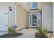 Close-up of front door with glass panels and wreath and house number 313 at 313 Palladium Dr., Surfside Beach, SC 29575