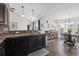 Kitchen featuring a sink, dishwasher, tile backsplash, and eat-in dining area at 313 Palladium Dr., Surfside Beach, SC 29575