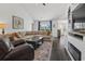 Spacious living room with comfortable seating, dark wood floors, and natural light at 313 Palladium Dr., Surfside Beach, SC 29575