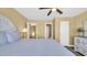 Comfortable bedroom with doors leading to the bathroom and hallway at 324 S Waccamaw Dr., Garden City Beach, SC 29576