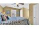 Bedroom featuring a comfortable bed with decorative pillows and a window for natural light at 324 S Waccamaw Dr., Garden City Beach, SC 29576