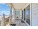 Charming deck with ocean view, perfect for relaxing or entertaining with sliding glass door access at 324 S Waccamaw Dr., Garden City Beach, SC 29576