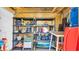 Organized garage interior featuring shelving units for ample storage, showcasing functionality at 324 S Waccamaw Dr., Garden City Beach, SC 29576