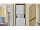 Convenient laundry area with a stacked washer and dryer at 324 S Waccamaw Dr., Garden City Beach, SC 29576