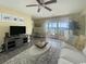 Bright living room with water view, coastal decor, and comfortable seating area at 324 S Waccamaw Dr., Garden City Beach, SC 29576