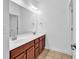 Bathroom featuring double sinks with granite countertops and tile flooring at 3315 Saddlewood Circle, Myrtle Beach, SC 29579