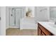 Bathroom featuring a walk-in shower, large tub, and a spacious vanity at 3315 Saddlewood Circle, Myrtle Beach, SC 29579