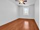 Bedroom featuring light-filled interiors, ceiling fan, and lustrous hardwood flooring at 3315 Saddlewood Circle, Myrtle Beach, SC 29579