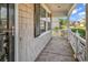 Charming front porch with decorative railing and stone accents at 3315 Saddlewood Circle, Myrtle Beach, SC 29579