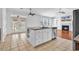 Bright kitchen with a center island, stainless steel appliances, and patio access at 3315 Saddlewood Circle, Myrtle Beach, SC 29579