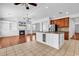 Open kitchen featuring a large island, stainless appliances, and seamless flow to the living room at 3315 Saddlewood Circle, Myrtle Beach, SC 29579