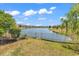 A tranquil lake view bordered by manicured lawns and community homes at 3315 Saddlewood Circle, Myrtle Beach, SC 29579