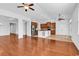 Spacious living area open to the kitchen, featuring hardwood floors and ample lighting at 3315 Saddlewood Circle, Myrtle Beach, SC 29579