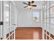 Bright office space with hardwood floors, ceiling fan, and natural light from the window at 3315 Saddlewood Circle, Myrtle Beach, SC 29579