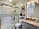 Bathroom featuring a glass door shower and a brushed nickel vanity at 3979 Forsythia Ct. # 203, Myrtle Beach, SC 29588