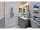 Stylish bathroom with a gray vanity and nautical-themed decor at 3979 Forsythia Ct. # 203, Myrtle Beach, SC 29588