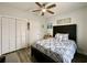 Comfortable bedroom with a coastal theme and ceiling fan at 3979 Forsythia Ct. # 203, Myrtle Beach, SC 29588