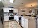 Well-equipped kitchen with stainless appliances, breakfast bar, and an open concept design at 3979 Forsythia Ct. # 203, Myrtle Beach, SC 29588