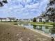Scenic pond view showcases serene condo community with lush landscaping and wildlife at 3979 Forsythia Ct. # 203, Myrtle Beach, SC 29588
