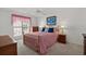 Bedroom with a queen-sized bed, a window, a ceiling fan, and classic decor at 432 Warrington Way # 432, Murrells Inlet, SC 29576