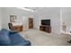 Bonus room featuring desk, couch, TV, and natural light at 432 Warrington Way # 432, Murrells Inlet, SC 29576
