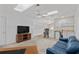 Bonus room featuring desk, couch, TV, kitchenette, and natural light at 432 Warrington Way # 432, Murrells Inlet, SC 29576