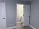 A bedroom with a door to the bathroom at 4350 Intercoastal Dr. # 2302, Little River, SC 29566