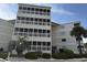 A beautiful shot of the exterior of the building showing multiple balconies and landscaping at 4350 Intercoastal Dr. # 2302, Little River, SC 29566