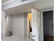 Open view from kitchen showing the laundry room with modern appliances at 4350 Intercoastal Dr. # 2302, Little River, SC 29566