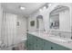 Bright bathroom featuring double vanity, granite countertops, framed mirrors and subway tile shower at 4470 Little River Inn Ln. # 1005, Little River, SC 29566